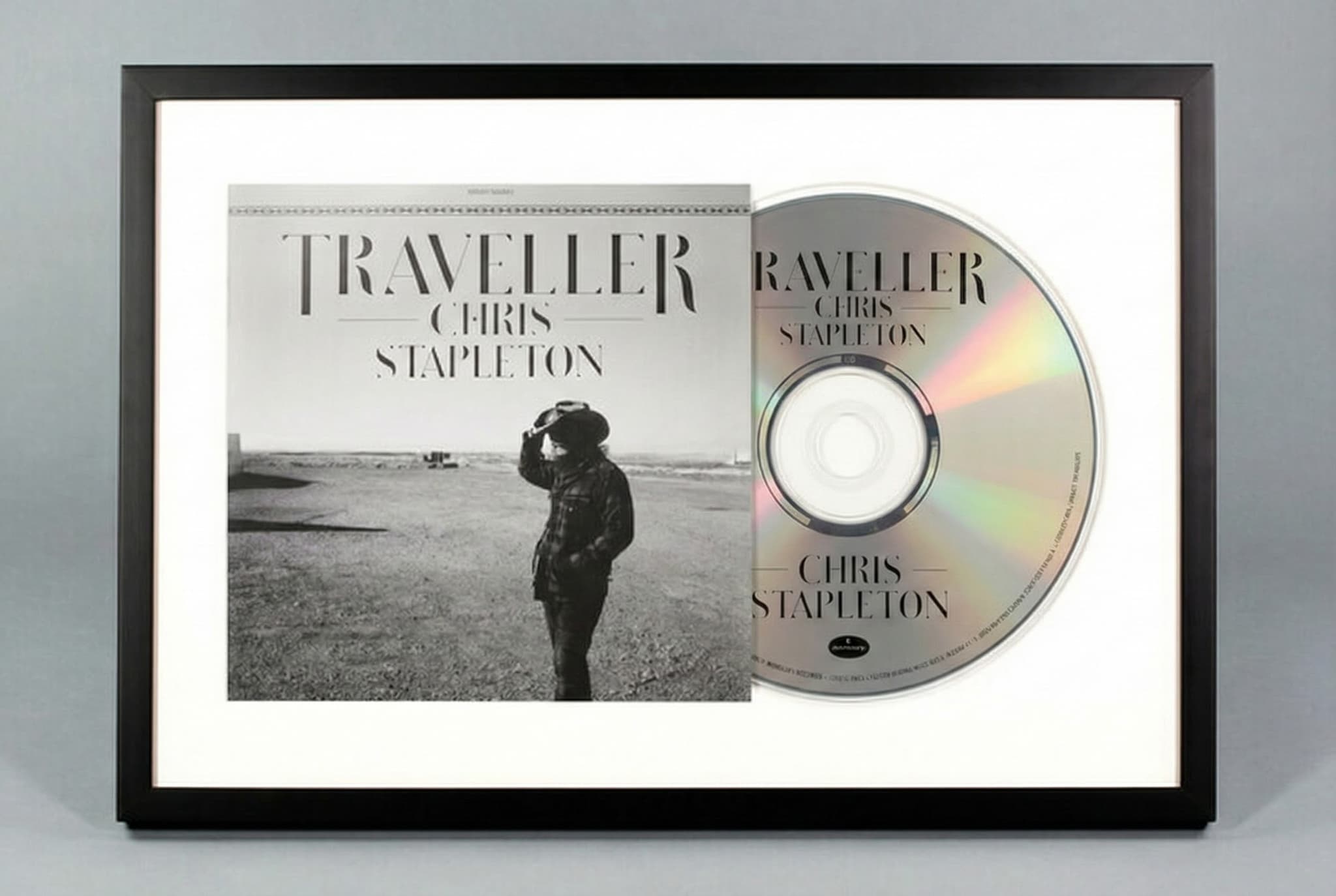 Close-up of custom CD frame showing archival mat board and framer's grade acrylic glazing